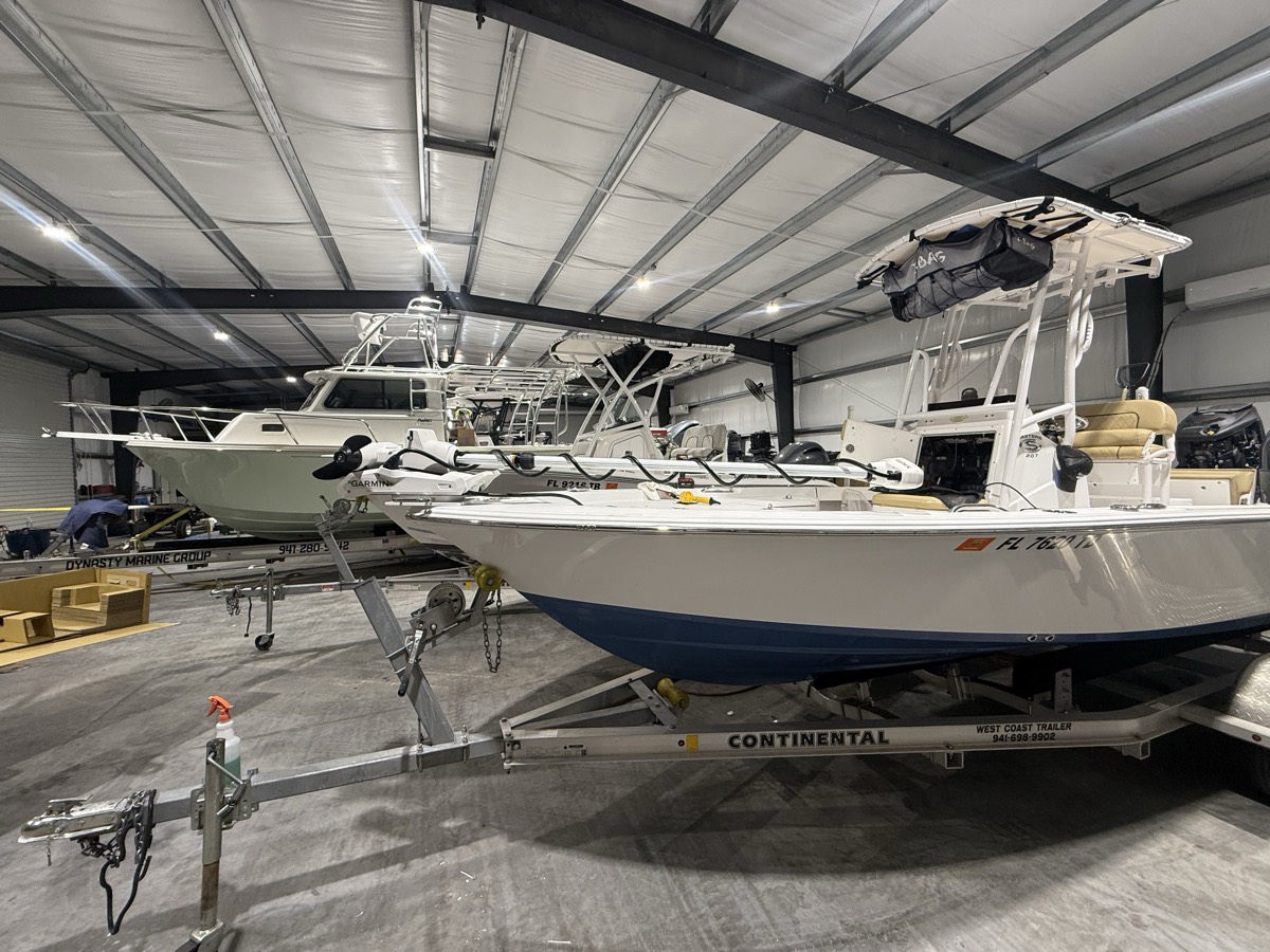 Boats lined up in the service bay at Dynasty Marine Customs