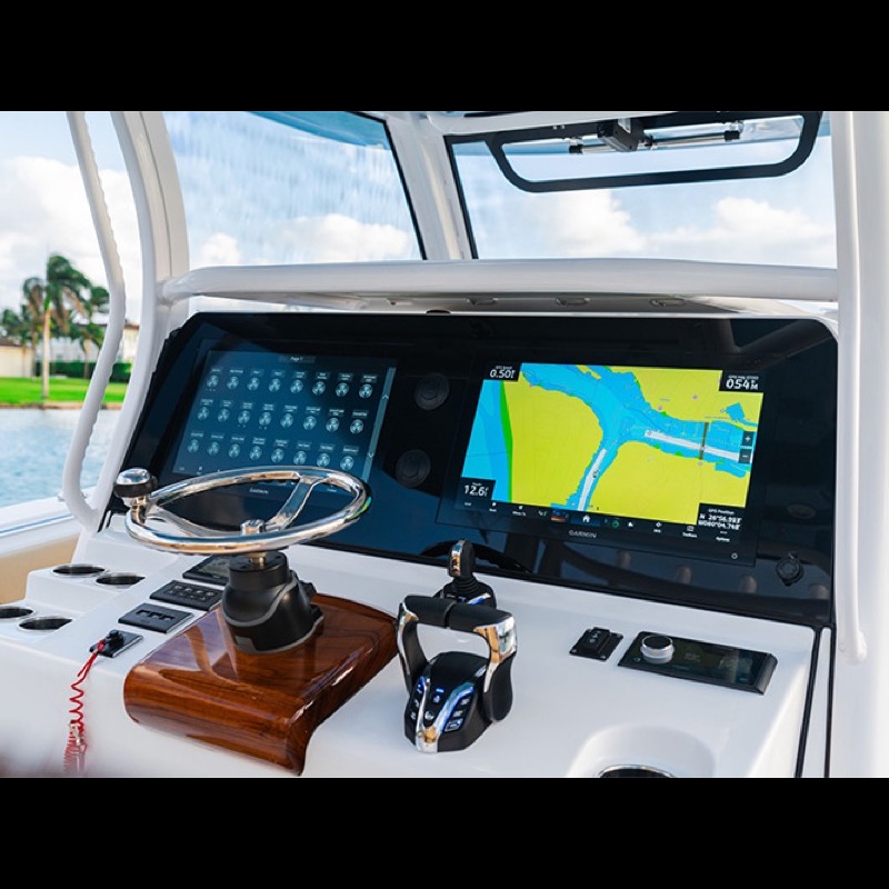 Finished helm with twin Garmin displays installed by Dynasty Marine Customs