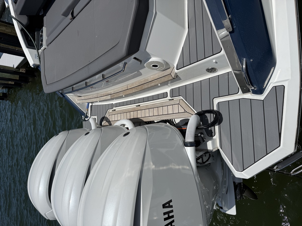 Marine decking on the swim platform of a cruiser powered by quad Yamaha outboards