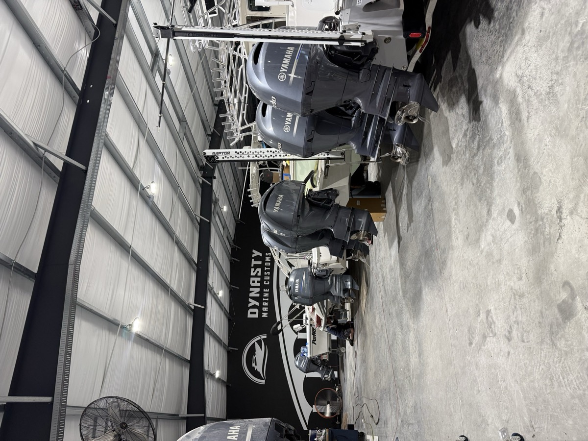 Boats in for service inside the Dynasty Marine Customs shop in Sarasota, Florida