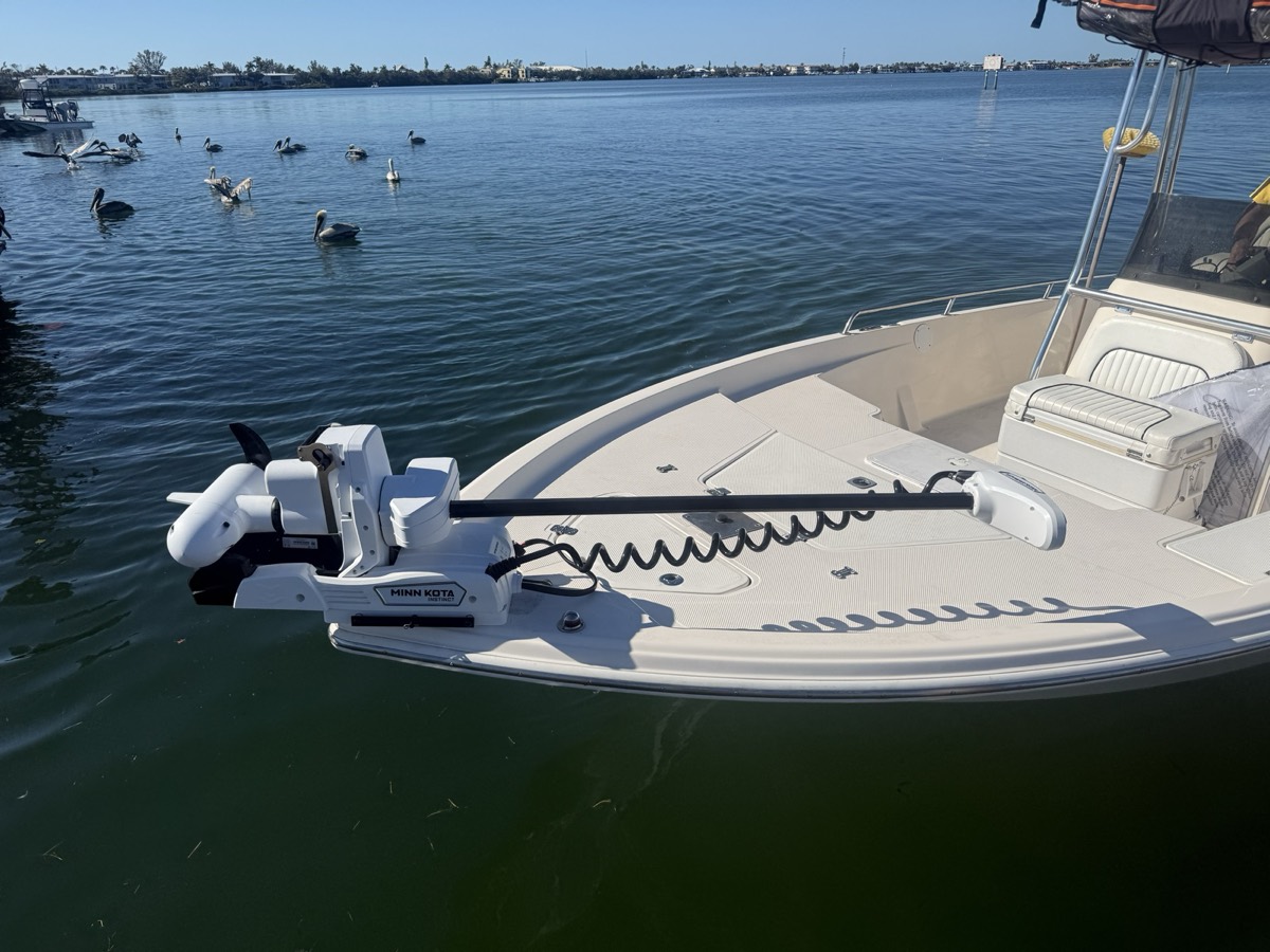 Bow-mounted trolling motor stowed on a bay boat on the water in Sarasota
