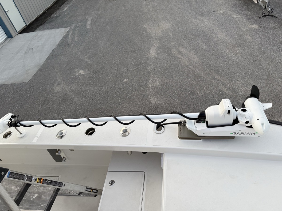 Close-up of a Garmin trolling motor mount and cable management on a bow deck