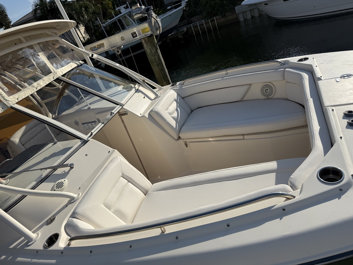 Cockpit seating and bolsters redone in cream marine vinyl on a cruiser